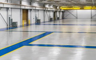 This image shows an industrial space with epoxy flooring.